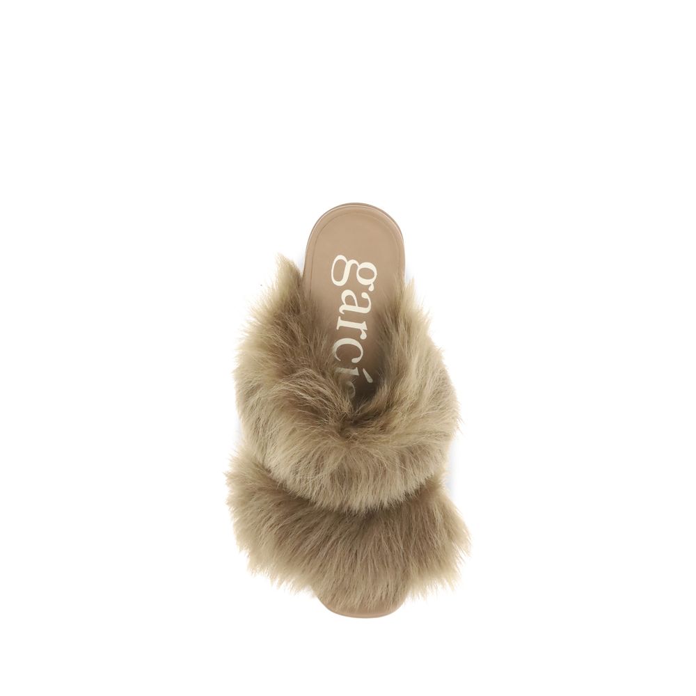 Fur-trimmed mules Sandals